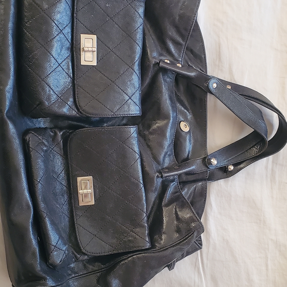 CHANEL Black Quilted Leather Bag with Silver Hardware